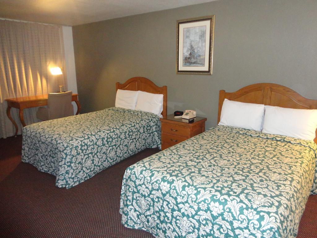 Garden Inn And Suites Silsbee Bilik gambar